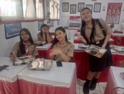 Sinergi Amankan Program Gizi, Polsek Langowan Barat Pastikan Pelajar Sehat Terpenuhi